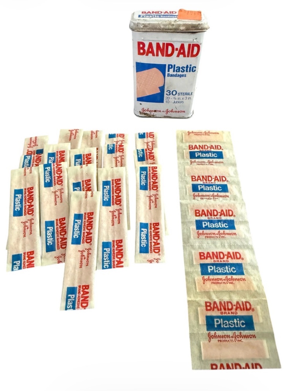 The 80's Vintage J&J Band-Aid Tin with 30 ct plastic bandages Collectible.